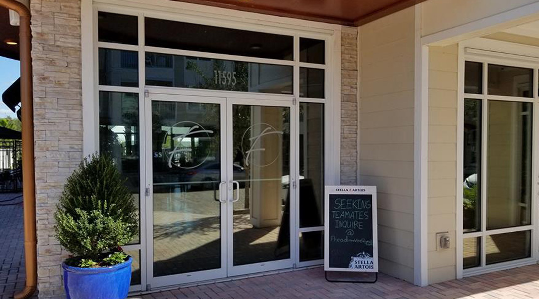 image of storefront windows tinted by Sunshield window tinting in Westchase, FL